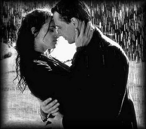 couple kissing in rain. couple kissing in the rain